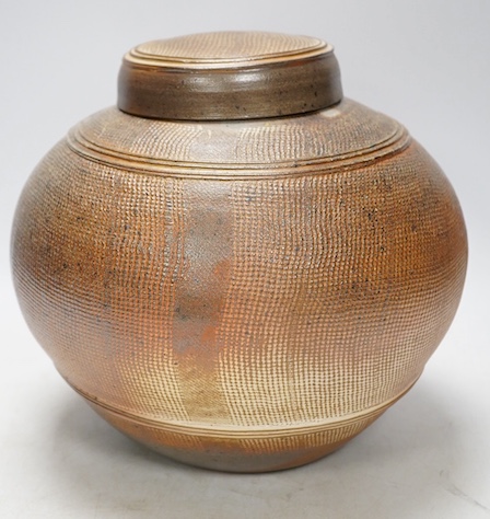 Thiebaut Chagué (b.1958), a studio stoneware jar and cover, 22cm tall. Condition - good